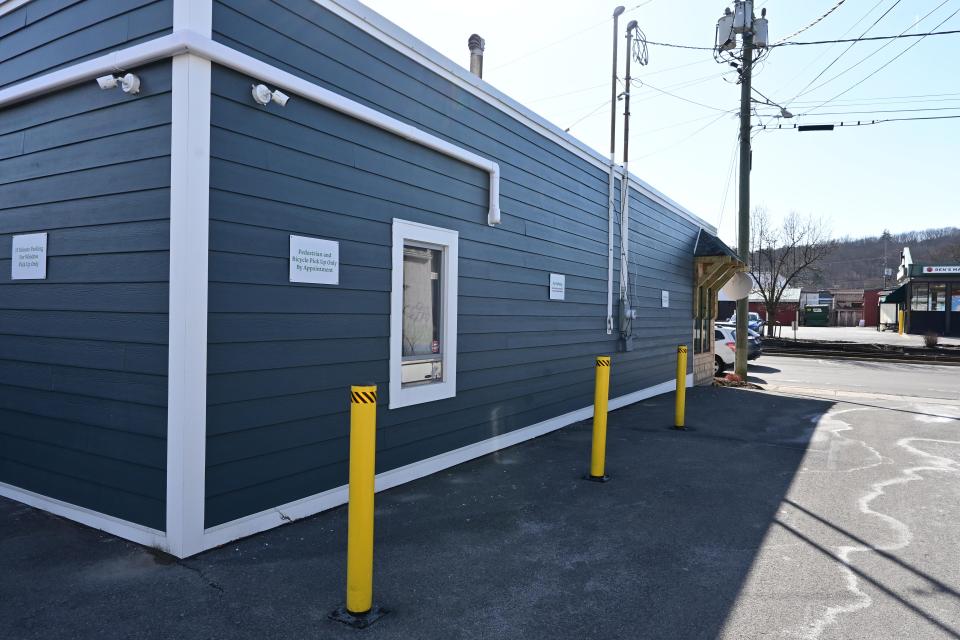 The outside of Aspire Cannabis Shop on Fulton Street in Ithaca. This once-planned drive through window will now be a walk-up pickup window.