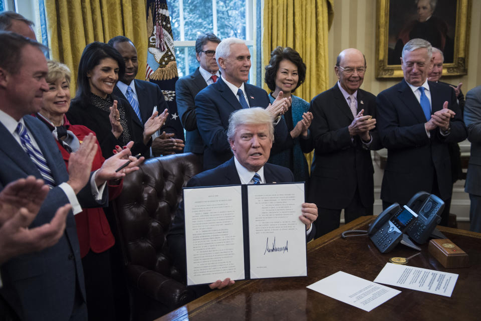 Trump surrounded by members of his cabinet in March 2017. (Photo: The Washington Post via Getty Images)