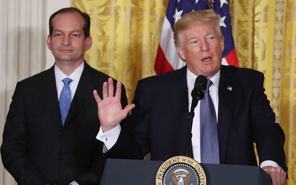 Alex Acosta, the labour secretary, pictured with Donald Trump. Mr Acosta insists he did not bungle the 2007 investigation into Jeffrey Epstein - Getty Images North America