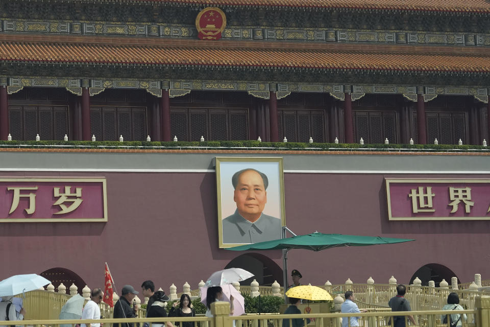 A Chinese paramilitary policeman watches over Tiananmen Gate in Beijing, Tuesday, June 4, 2024. As Beijing's toughened political stance effectively extinguished any large-scale commemorations within its borders, overseas commemorative events have grown increasingly crucial for preserving memories of the Tiananmen crackdown. (AP Photo/Ng Han Guan)