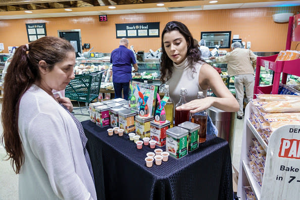 a sample table at the grocery store