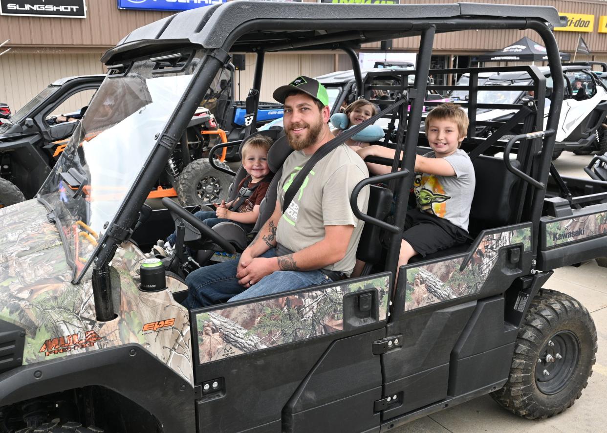 With his wife at work, Cody Cronkite borrowed an ORV from his family to take his kids, ages 3, 5, and 8, on the ride. "I'm getting back into this."