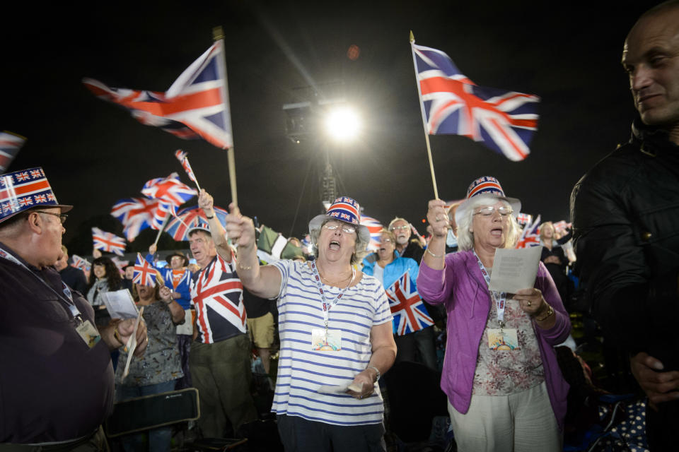 Festival goers sing Rule Brittania at BBC Proms in the Park, in Hyde Park, London. PRESS ASSOCIATION Photo. Picture date: Saturday September 10, 2016. Photo credit should read: Matt Crossick/PA Wire. 