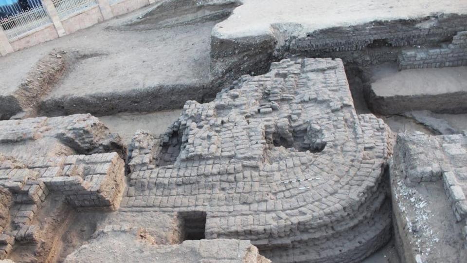 The crumbled remains of a thick wall from the newly discovered building.