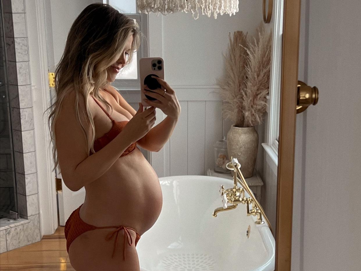 Katrina Scott showing off her pregnancy bump