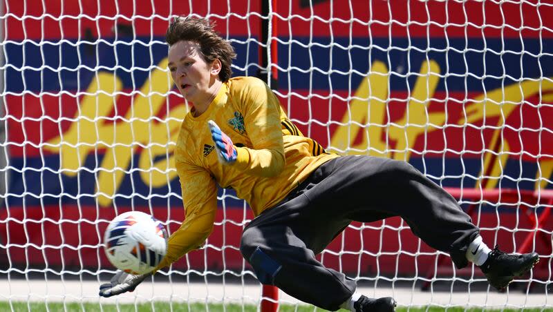 Rowland Hall Winged Lions’ goalkeeper Brock Paradise makes a stop during penalty kicks as they and the American Heritage Patriots play for the 2A soccer championship at America First Field in Sandy on Saturday, May 11, 2024.