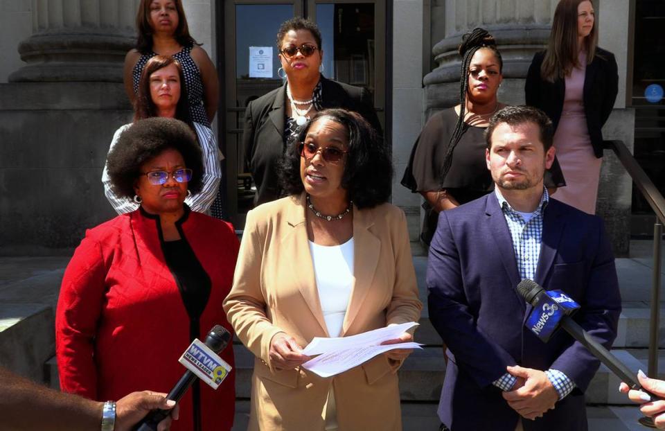 Danielle Forté , center,the Muscogee County Clerk of Superior and State Courts, reads for the press the statement she made in federal court Thursday morning during the sentencing hearing for Willie Demps. 06/02/2022