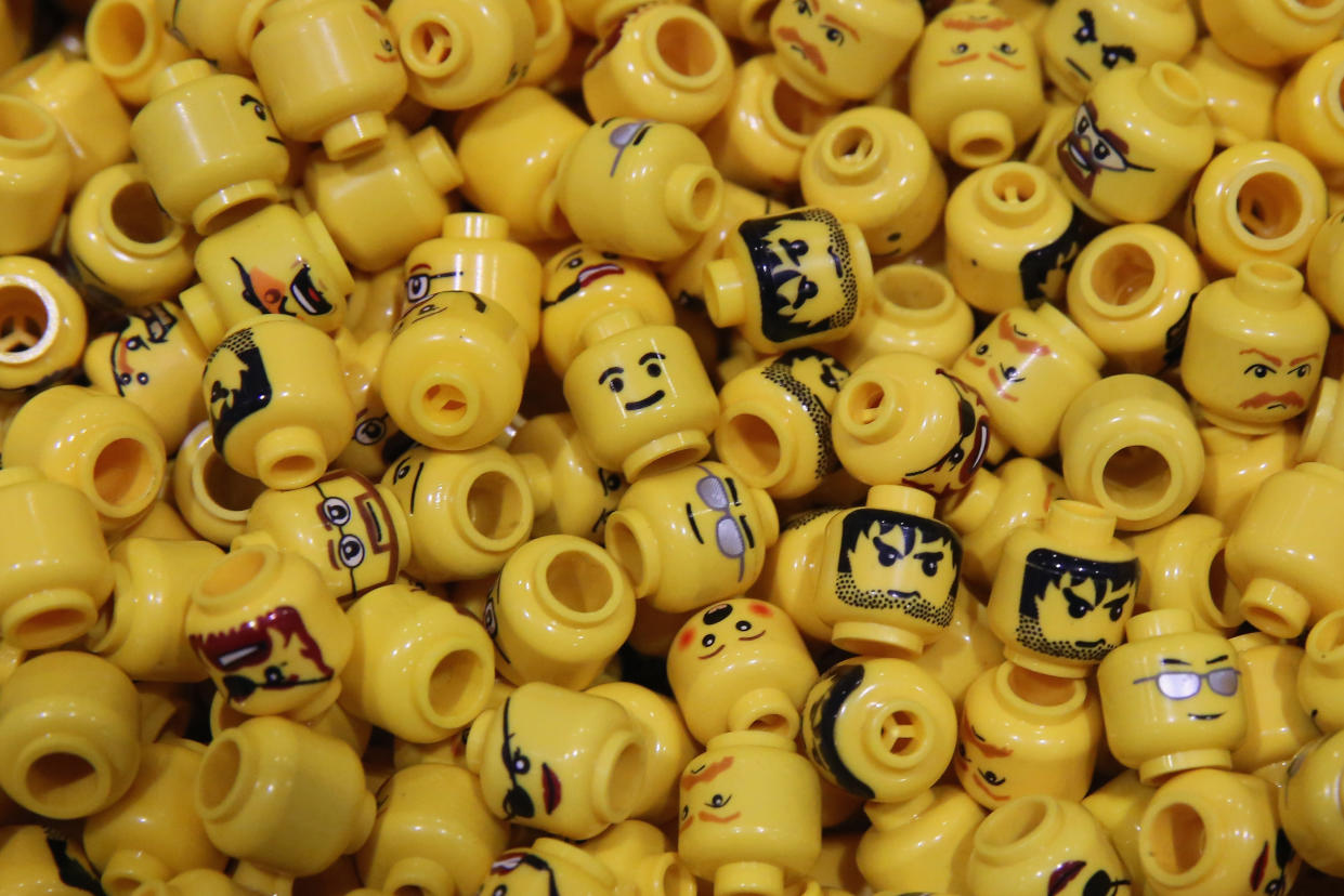 Lego figure heads are displayed in London. (Photo: Dan Kitwood/Getty Images)