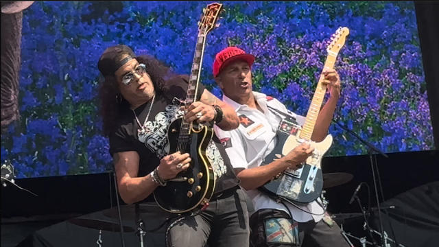 Watch Slash and Tom Morello's spicy Graspop guitar battle