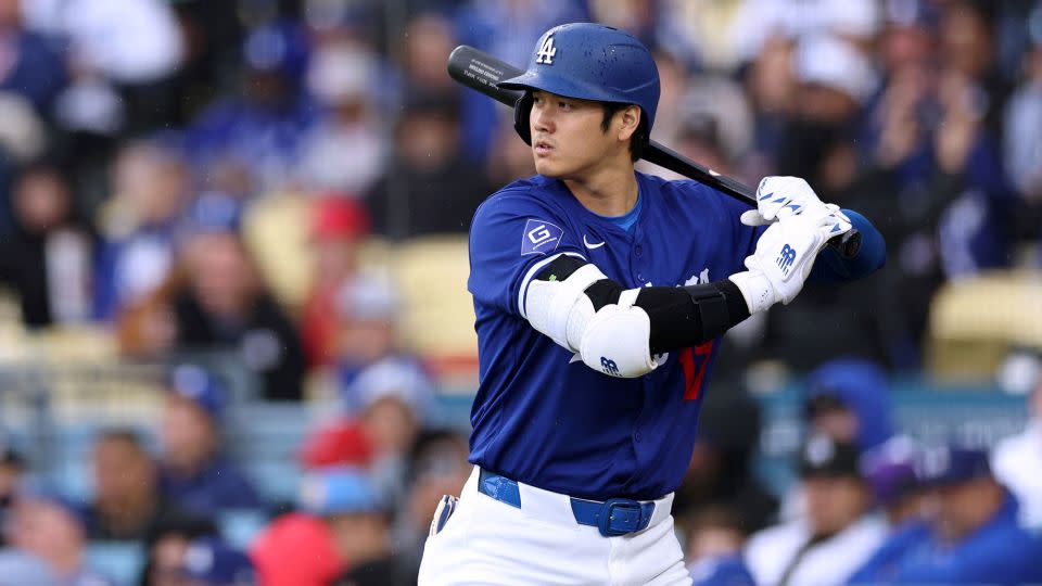 Ohtani prepares for a pitch during the Dodgers' preseason game against the Los Angeles Angels. - Harry How/Getty Images