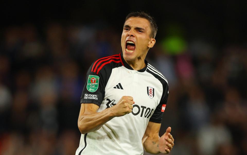 oao Palhinha of Fulham celebrates after scoring their team's fourth penalty