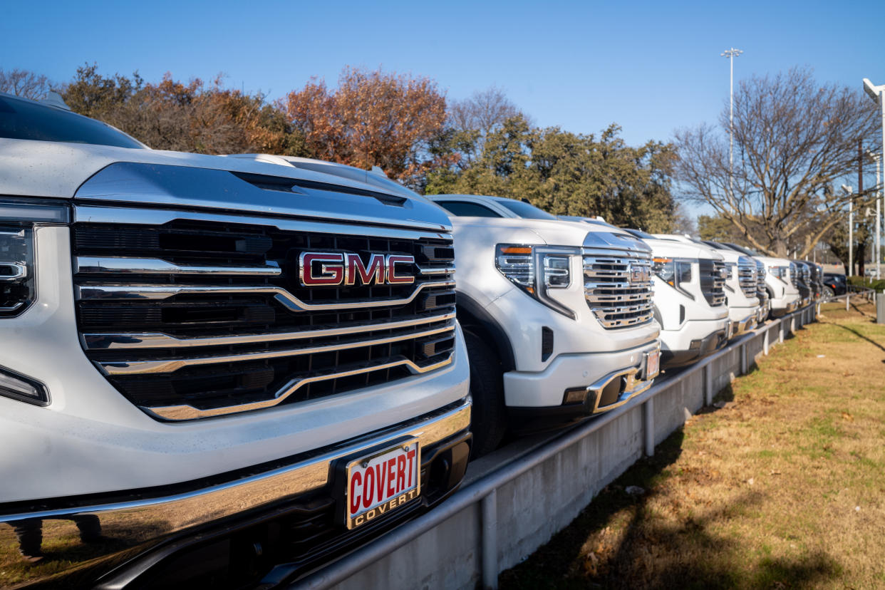 AUSTIN, TEXAS - JANUARY 05: GMC pickup trucks are displayed for sale on a lot at a General Motors dealership on January 05, 2023 in Austin, Texas. General Motors has reclaimed its title as the top-selling carmaker in the U.S. after outselling Toyota in 2022. GM reported that the company sold approximately 2.7 million vehicles last year, while Toyota came in just over 2.1 million vehicles sold. (Photo by Brandon Bell/Getty Images)