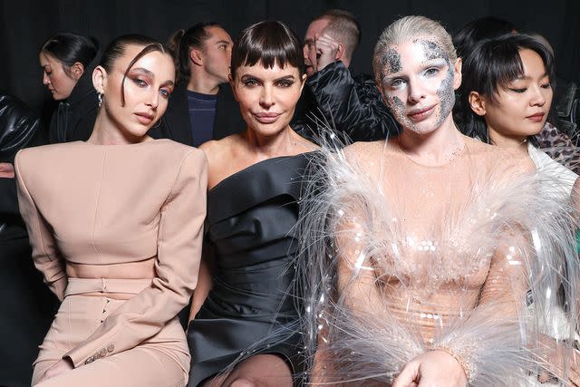 <p>Pascal Le Segretain/Getty</p> (L-R) Emma Chamberlain, Lisa Rinna and Julia Fox attend the Mugler Womenswear Fall/Winter 204-2025 show as part of Paris Fashion Week on March 03, 2024 in Paris, France.