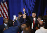 Vice President Mike Pence waves to the crowd after he speaks during a rally on Tuesday, June 25, 2019 in Miami. (AP Photo/Brynn Anderson)