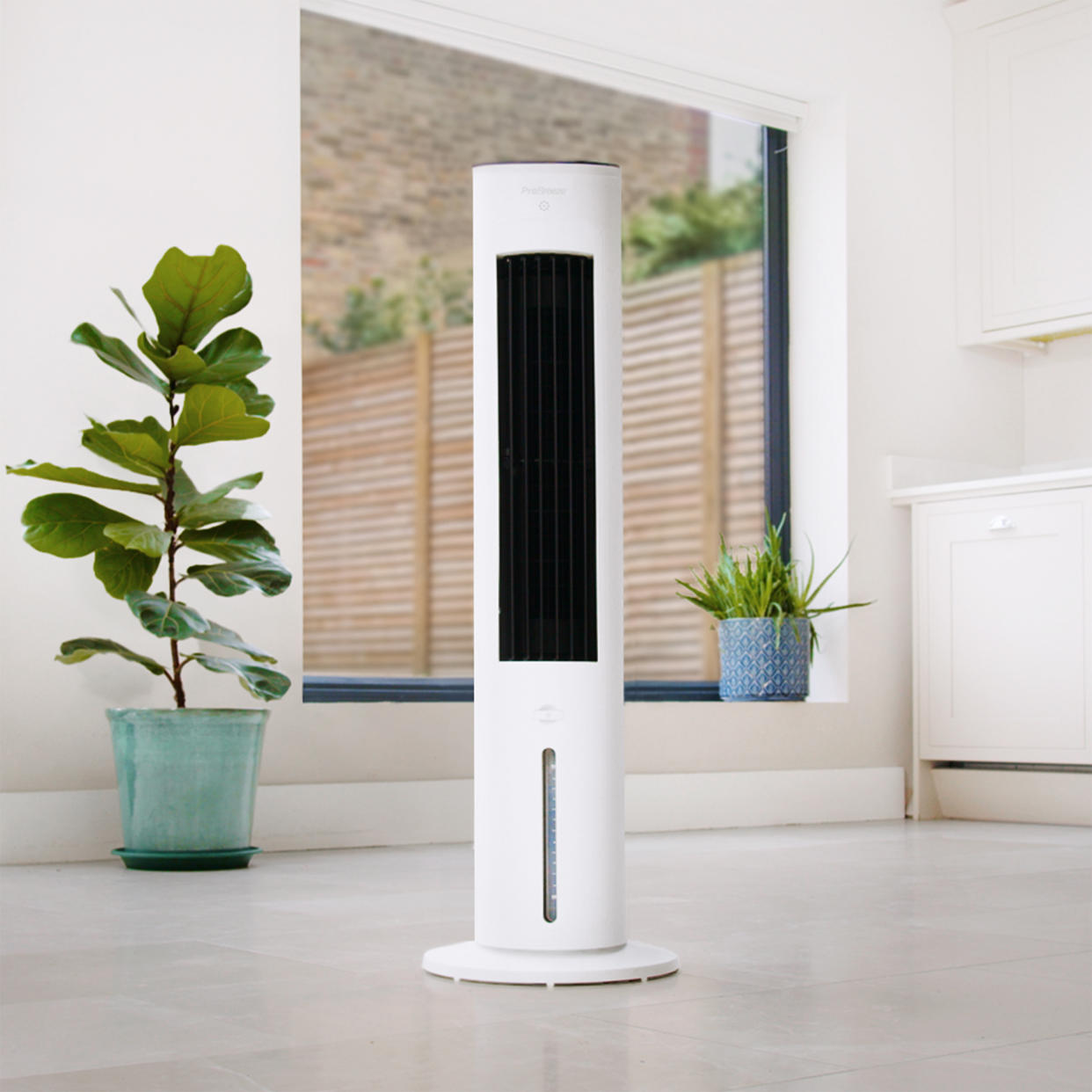  Pro Breeze air cooler and portable tower fan in living room. 