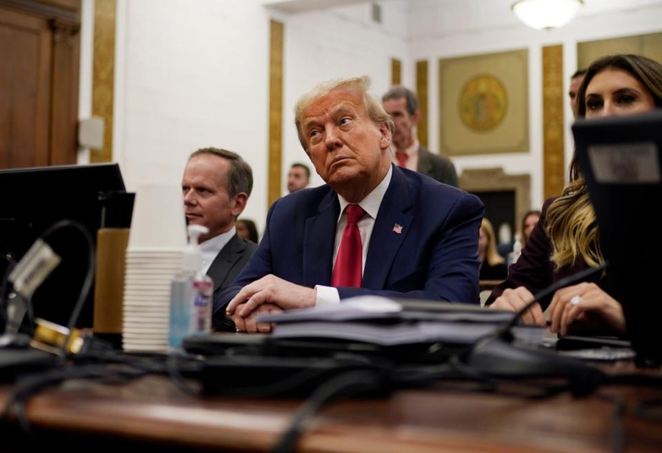 Former President Donald Trump sits in the courtroom with his legal team (AP)