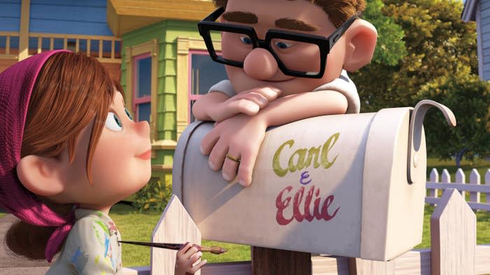 Carl and Ellie looking at each other next to their "Carl & Ellie" mailbox
