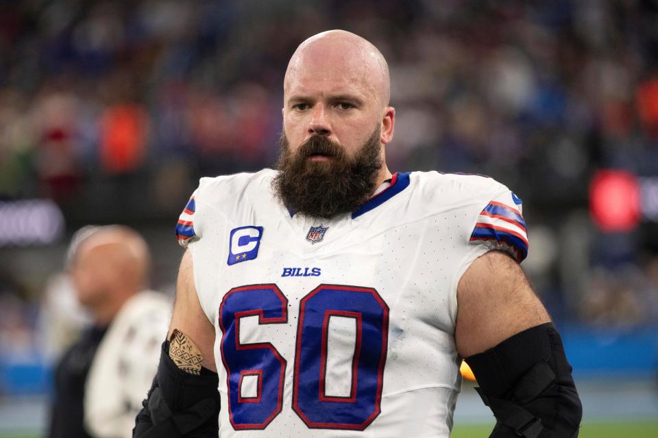 Buffalo Bills center Mitch Morse (60) looks on during an NFL football game against the Los Angeles Chargers, Dec. 23, 2023, in Inglewood, Calif. The Bills' salary cap-related purge of players cut deep into the team's core with veteran safety Jordan Poyer and center Morse being among five players the team announced it released Wednesday, March 6, 2024.