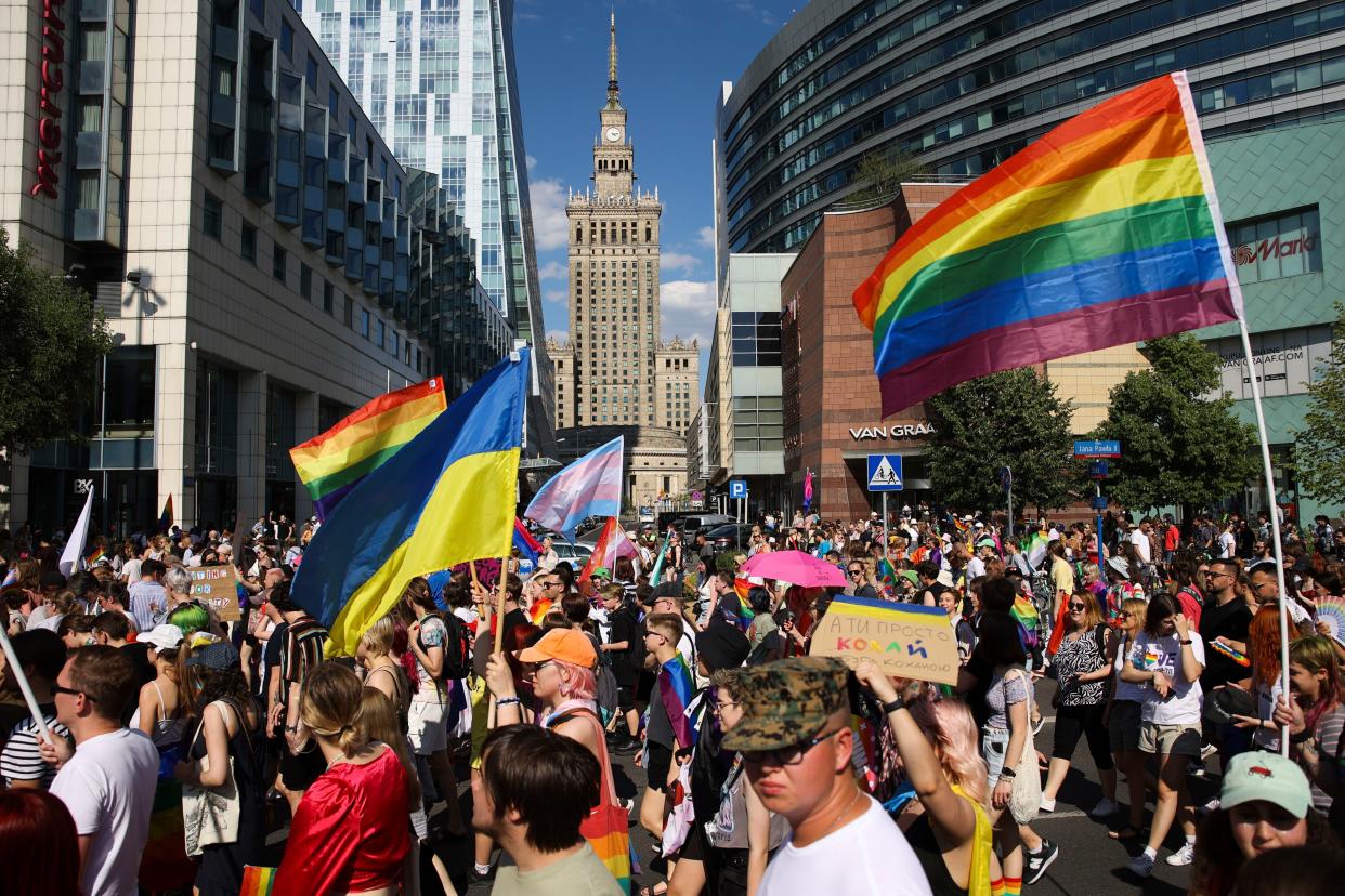 People take part in the 'Warsaw and Kyiv Pride' marching for freedom in Warsaw, Poland, on Saturday.