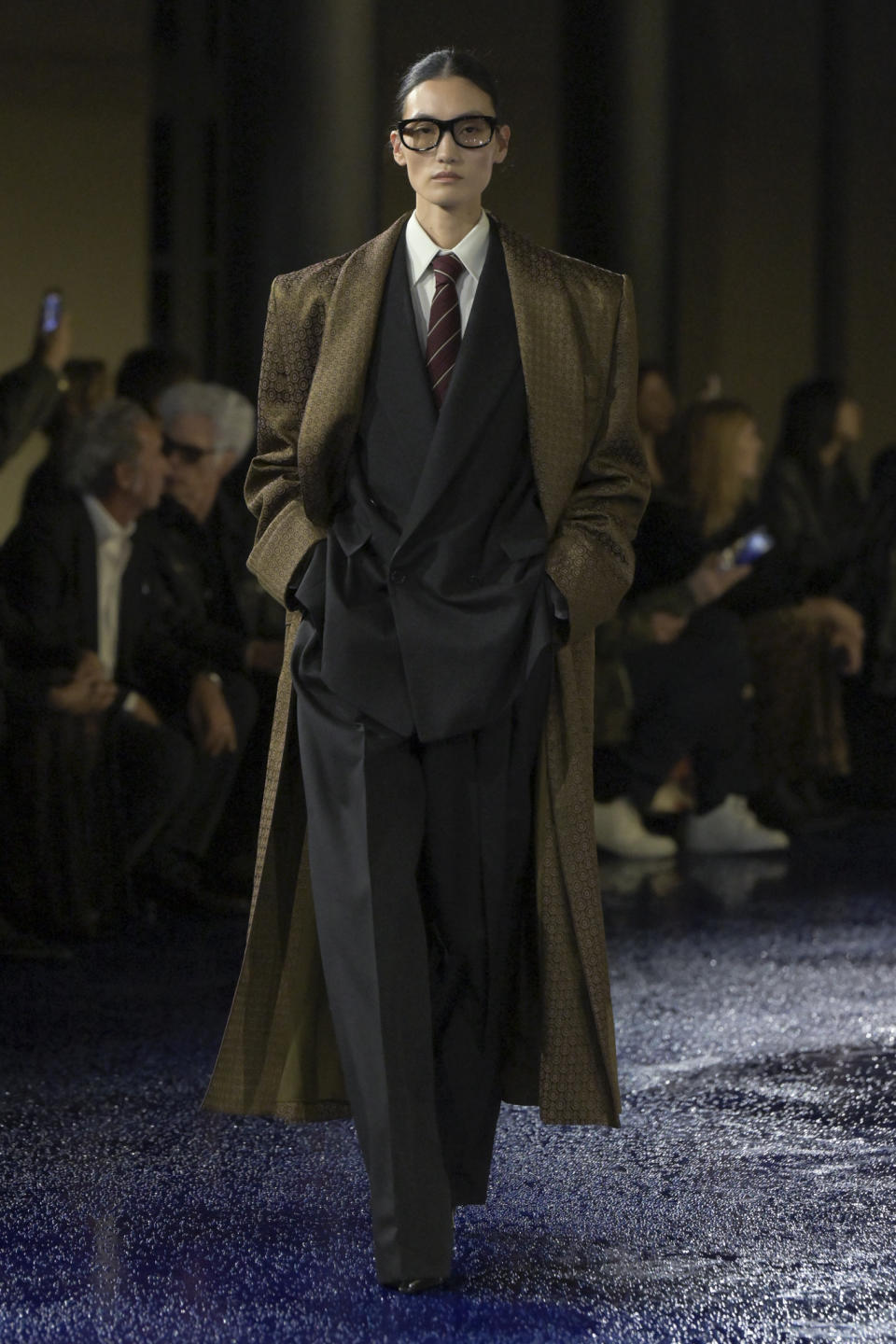 A suit at Saint Laurent with a brocade trench.