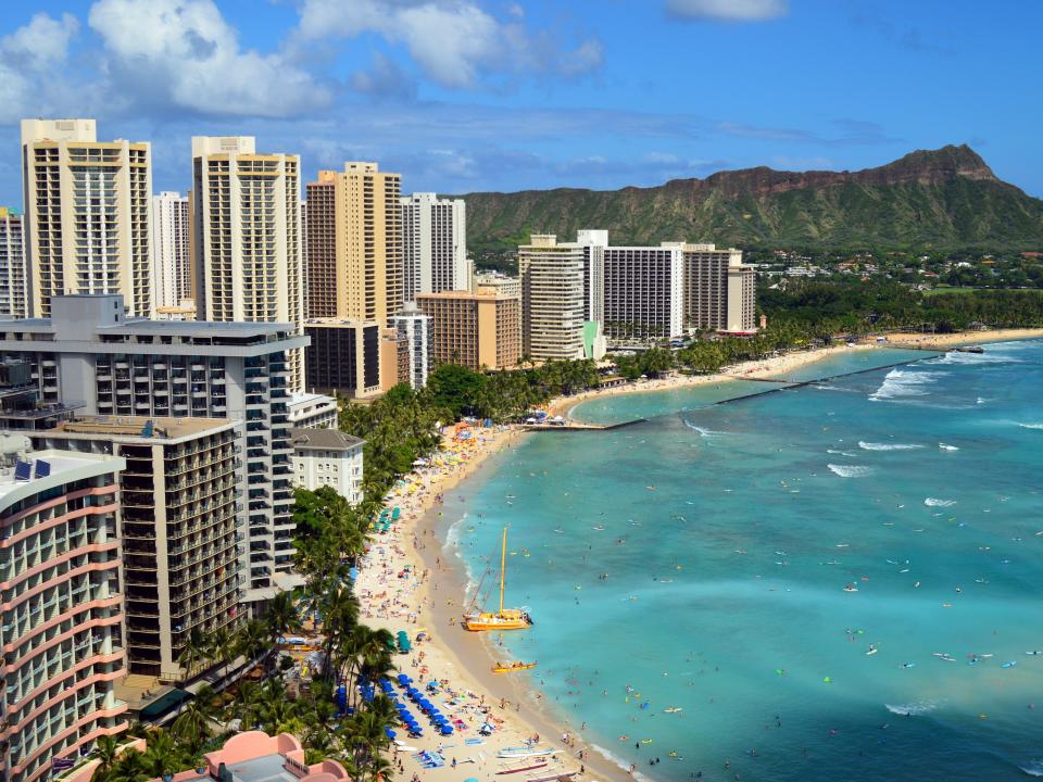 An aerial view of Waikiki Beach in Hawaii with Diamond Head in the background.