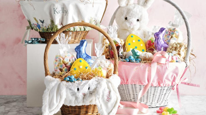 a basket with rabbits in it
