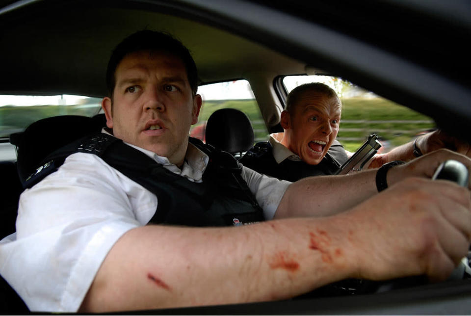 <a href="http://movies.yahoo.com/movie/hot-fuzz/" data-ylk="slk:HOT FUZZ;elm:context_link;itc:0;sec:content-canvas" class="link ">HOT FUZZ</a> (2007) <br>Directed by: Edgar Wright <br>Starring: Simon Pegg and Nick Frost<br>