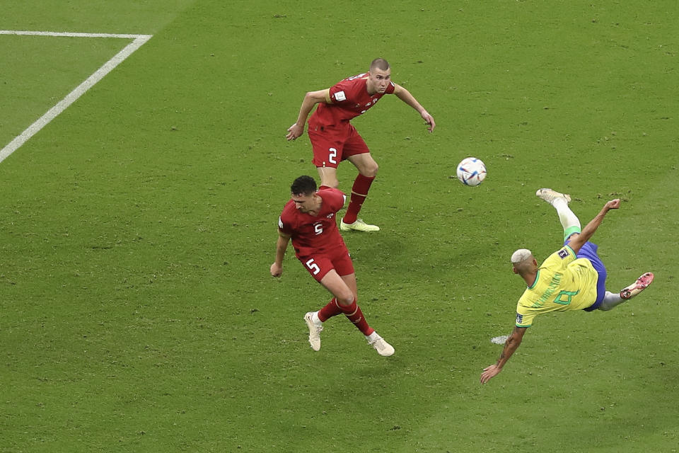 Richarlison (pictured right) scores a goal.