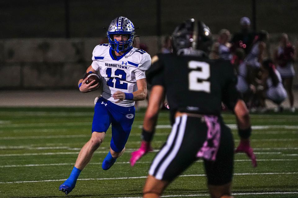 Georgetoen quarterback Kaleb McDougle (12) runs the ball during the game against Rouse at John Gupton Stadium on Thursday, Oct. 10, 2024 in Cedar Park, Texas.