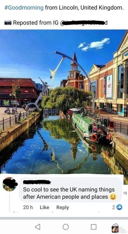 View of the Brayford Waterfront in Lincoln, United Kingdom, featuring boats on the canal, buildings along the shore, and an arch sculpture. Comment below: "So cool to see the UK naming things after American people and places ?"