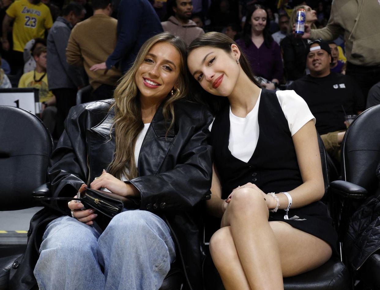 los angeles, california january 19 olivia rodrigo r at and tate mcrae attend the basketball game between the los angeles lakers and brooklyn nets cryptocom arena on january 19, 2024 in los angeles, california note to user user expressly acknowledges and agrees that, by downloading and or using this photograph, user is consenting to the terms and conditions of the getty images license agreement photo by kevork djanseziangetty images