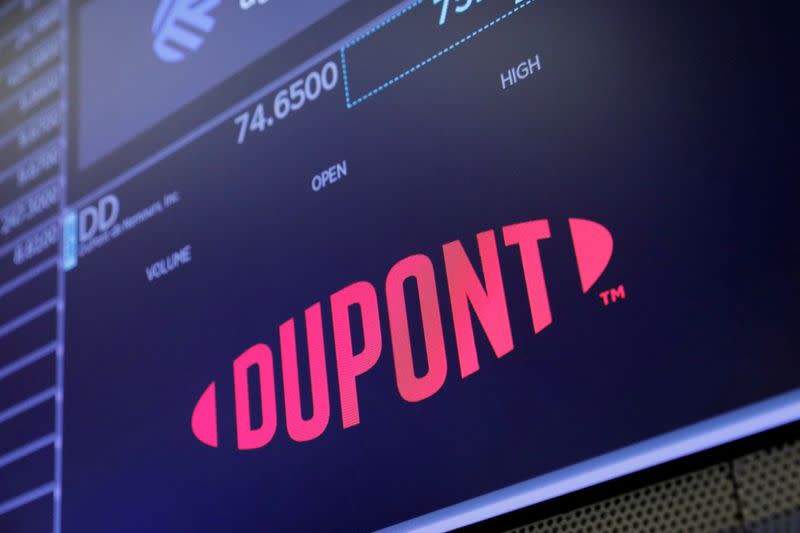FILE PHOTO: The logo DuPont de Nemours, Inc. for is seen on the trading floor at the New York Stock Exchange (NYSE) in Manhattan, New York City
