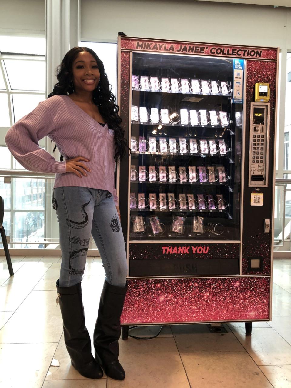 Mikayla Walker placed a vending machine on the third floor of Circle Centre Mall to sell false eyelashes and other beauty products from her Mikayla Janee Collection.