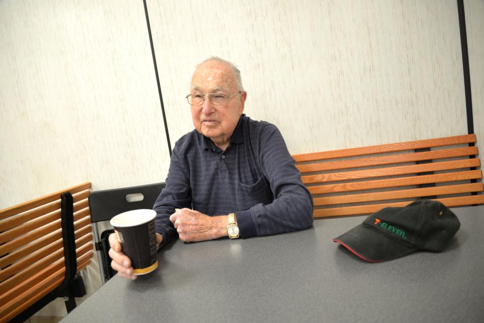 Orin Gilbert Jr., better known as "Mr. G," helps out at 7-Eleven.