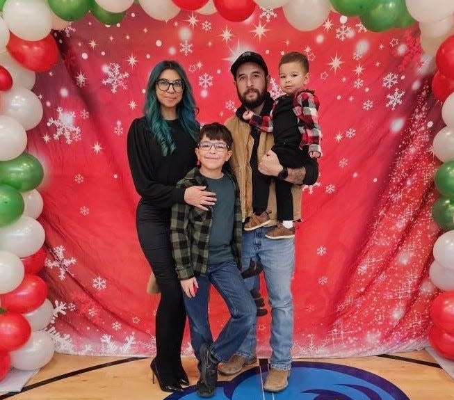 LCPD officer Jonah Hernandez with his family.