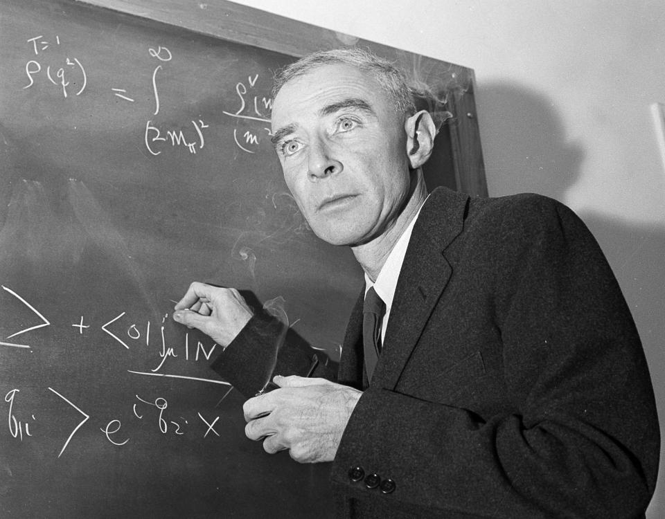 FILE - Dr. J. Robert Oppenheimer, creator of the atom bomb, is shown at his study at the Institute for Advanced Study, in Princeton, N.J., Dec. 15, 1957. The Biden administration has reversed a decades-old decision to revoke the security clearance of Oppenheimer, the physicist called the father of the atomic bomb for his leading role in World War II’s Manhattan Project. (AP Photo/John Rooney, File)