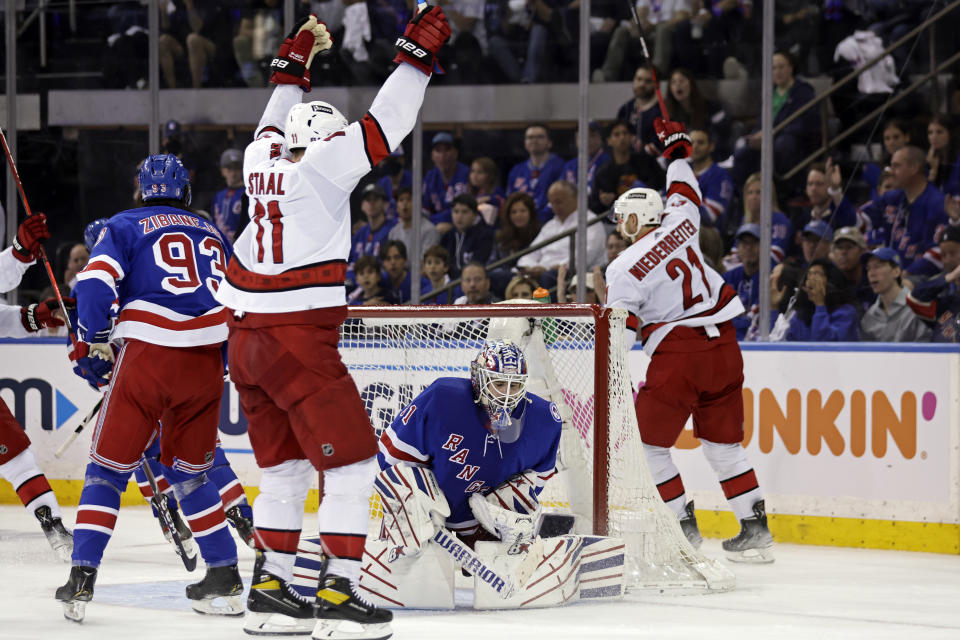 Carolina Hurricanes right wing Nino Niederreiter (21) reacts after scoring a goal past New York Rangers goaltender Igor Shesterkin during the second period of Game 3 of an NHL hockey Stanley Cup second-round playoff series, Sunday, May 22, 2022, in New York. (AP Photo/Adam Hunger)