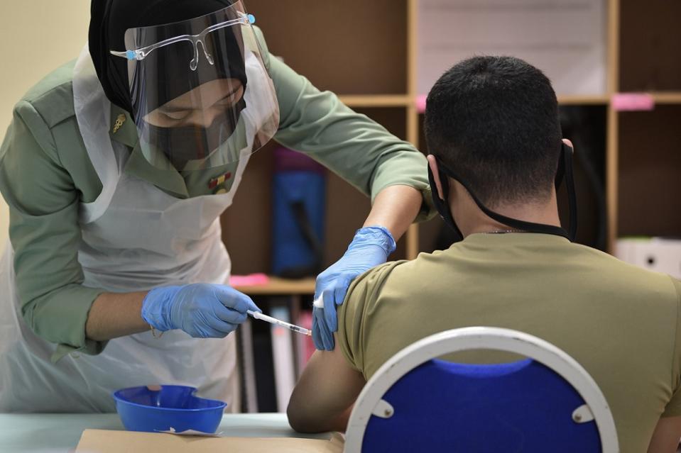 File photo of an army personnel receiving the Pfizer-BioNTech Covid-19 vaccine at Hospital Angkatan Tentera (HAT) Tuanku Mizan in Kuala Lumpur February 26, 2021. ― Bernama pic