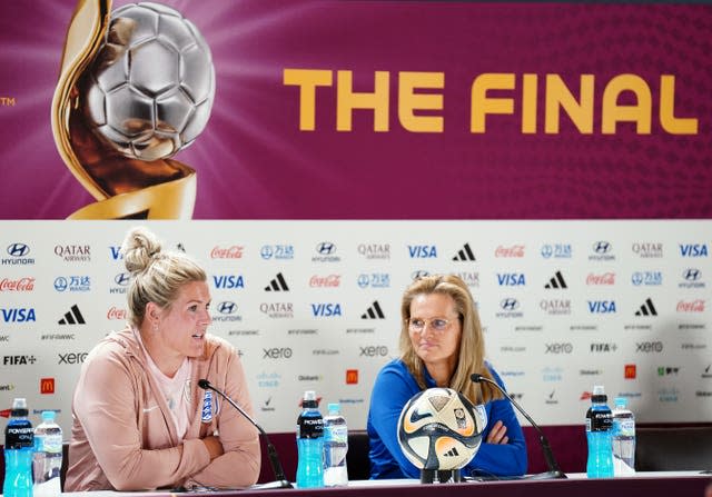 Millie Bright (left) and Sarina Wiegman face the media