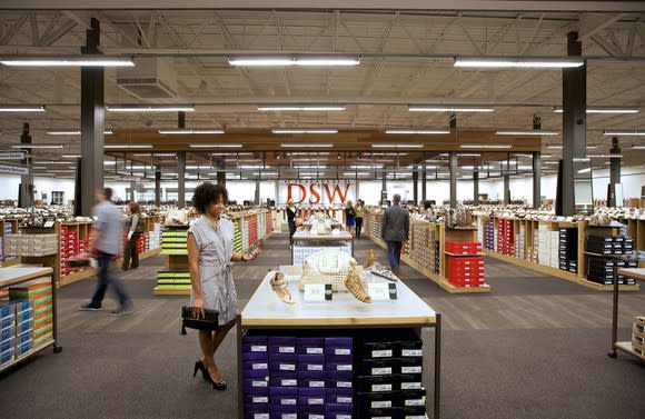 DSW Store with shoppers browsing