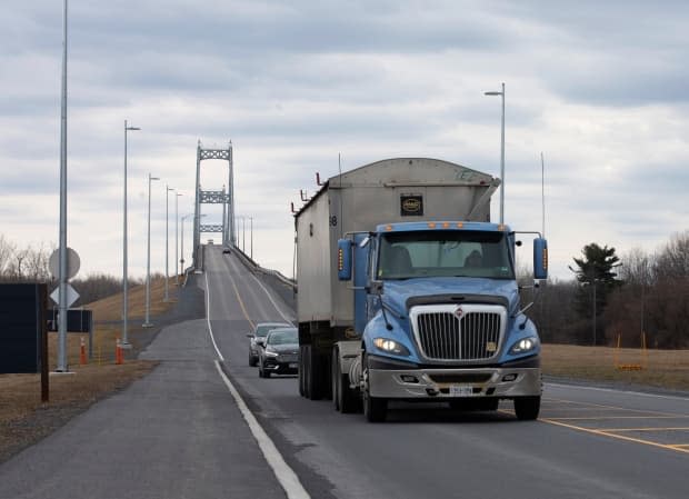 Funding for this bridge between upstate New York and the Ottawa-Montreal region, seen here in March 2020, was included in a major U.S. pandemic-relief bill. Then it was chopped. (Christine Muschi/Reuters - image credit)