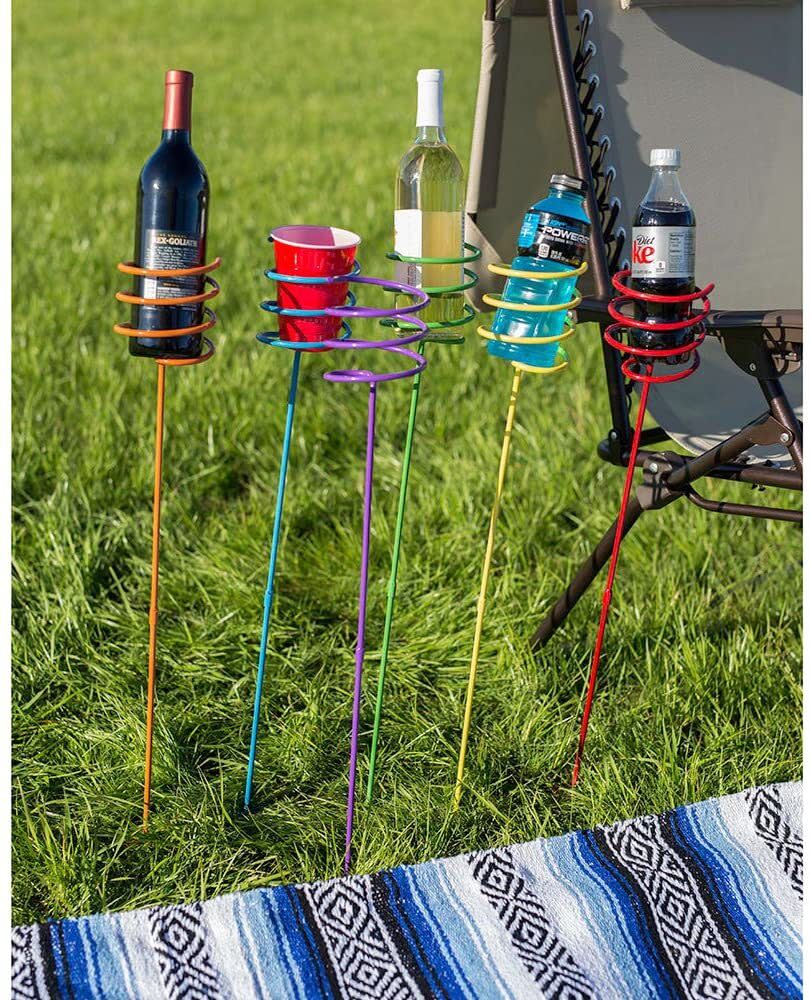 This genius invention will hold your cold beverages, soda cans and vino and keep them off the ground. They're also the perfect height for a camping or patio chair.<br /><br /><strong>Promising review:</strong> "One of the best items I have ever bought for the beach and backyard! <strong>Whether playing Cornhole or lounging in a chair, your drink is always clean and cold. No more sandy or dirty cans or bottles.</strong> It even holds your drink with a Koozie on it!" &mdash; <a href="https://amzn.to/3sNMOiZ" target="_blank" rel="nofollow noopener noreferrer" data-skimlinks-tracking="5580838" data-vars-affiliate="Amazon" data-vars-href="https://www.amazon.com/gp/customer-reviews/R28RU2FH13A8FR?tag=bfgenevieve-20&amp;ascsubtag=5580838%2C14%2C33%2Cmobile_web%2C0%2C0%2C1159958" data-vars-keywords="cleaning" data-vars-link-id="1159958" data-vars-price="" data-vars-product-id="16176859" data-vars-retailers="Amazon">Amazon Customer</a><br /><br /><strong>Get a set of six from Amazon for <a href="https://amzn.to/3sGGn1q" target="_blank" rel="nofollow noopener noreferrer" data-skimlinks-tracking="5580838" data-vars-affiliate="Amazon" data-vars-asin="B0168OB460" data-vars-href="https://www.amazon.com/dp/B0168OB460?tag=bfgenevieve-20&amp;ascsubtag=5580838%2C14%2C33%2Cmobile_web%2C0%2C0%2C1159973" data-vars-keywords="cleaning" data-vars-link-id="1159973" data-vars-price="" data-vars-product-id="1402849" data-vars-product-img="https://m.media-amazon.com/images/I/51xQiFLf7xL._SL500_.jpg" data-vars-product-title="Sunnydaze Outdoor Yard Drink Holder Stakes, Heavy Duty, Set of 6, Multi Colored" data-vars-retailers="Amazon">$37.95</a>.</strong>