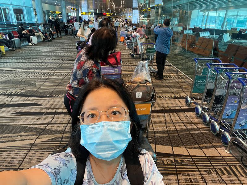 Chu Wenhong before boarding her flight to China from SIngapore
