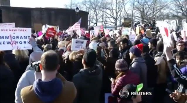 Thousands march the streets in protest of Trumps' travel ban on mainly Muslim countries. Picture: Reuters