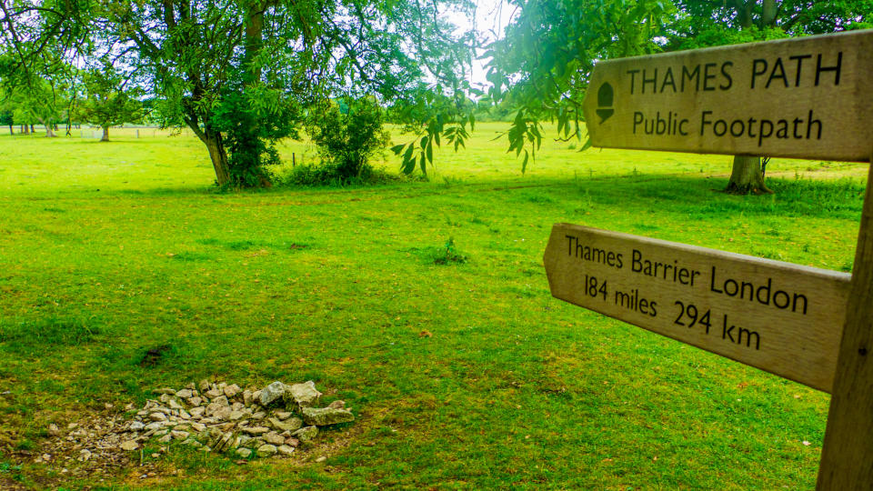 The source of the River Thames, with a signpost for the Thames Path