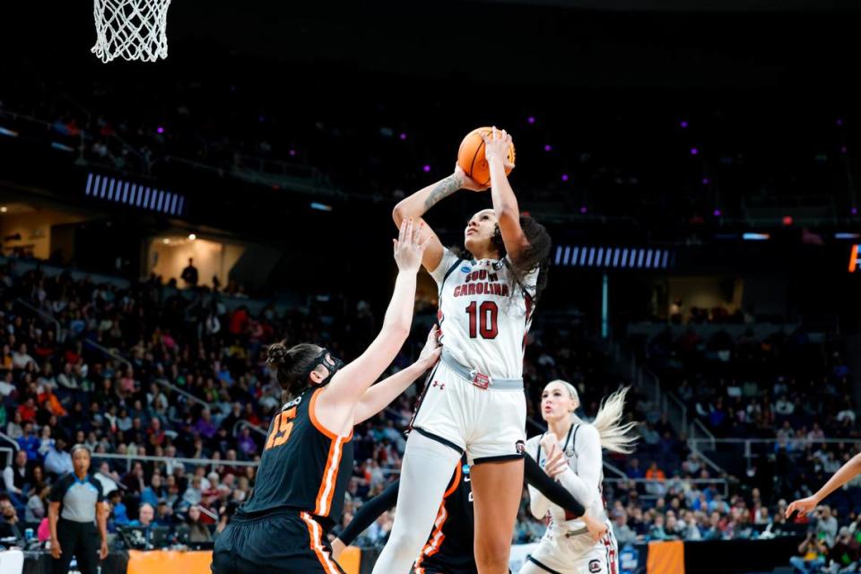 South Carolina’s Kamilla Cardoso (10) shoots as Oregon State’s Raegan Beers (15) pressures during the Elite Eight round of the NCAA Tournament at the MVP Arena in Albany, New York on Sunday, March 31, 2024.