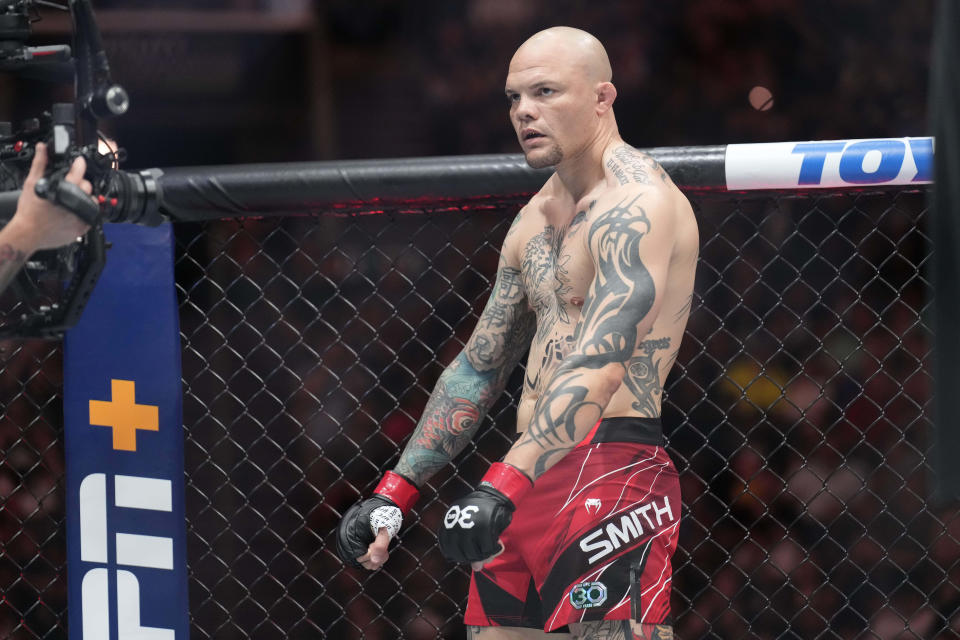 May 13, 2023; Charlotte, North Carolina, USA; Anthony Smith (red gloves) prepares to fight Johnny Walker (blue gloves) in a light heavyweight bout during UFC Fight Night at Spectrum Center. Mandatory Credit: Jim Dedmon-USA TODAY Sports