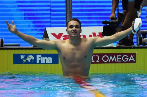 Hungary's Kristof Milak celebrates after smashing the 200m record at the world championships in Gwangju