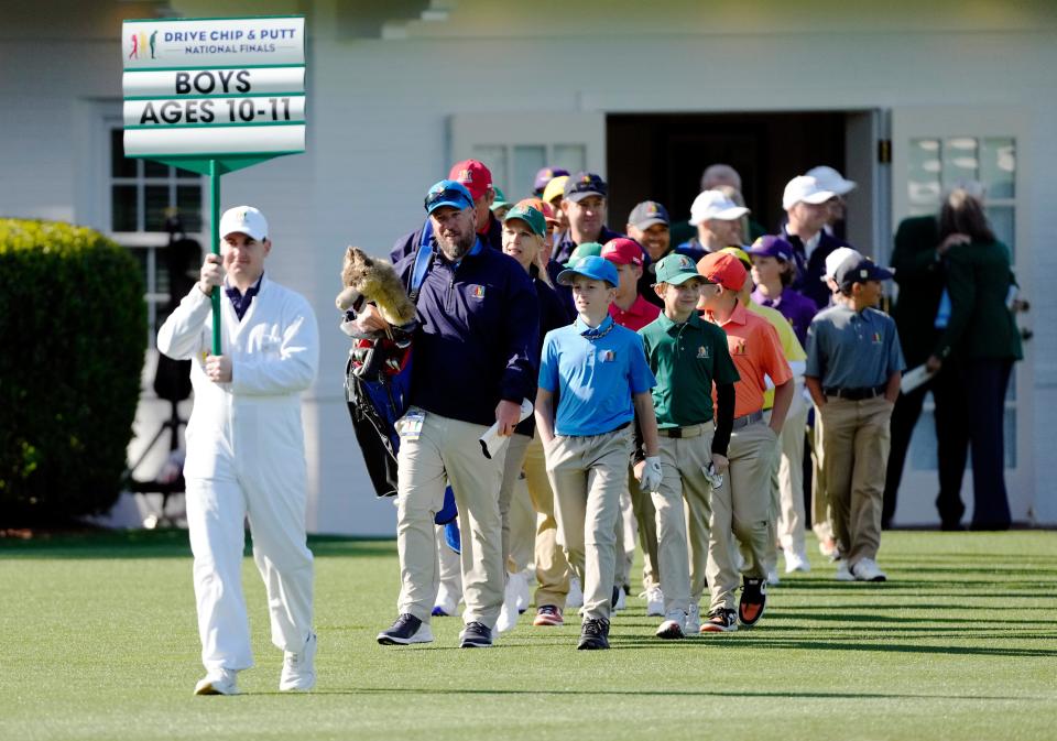 The boys 10-11 age group makes their way to drive portion during the Drive, Chip & Putt National Finals competition at Augusta National Golf Club.