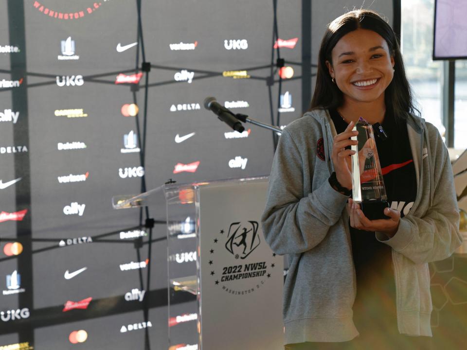 Sophia Smith poses with her 2022 NWSL MVP trophy.